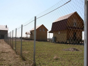 Забор из сетки рабицы в натяг с протяжкой арматуры 150 метров фото в Калининеце